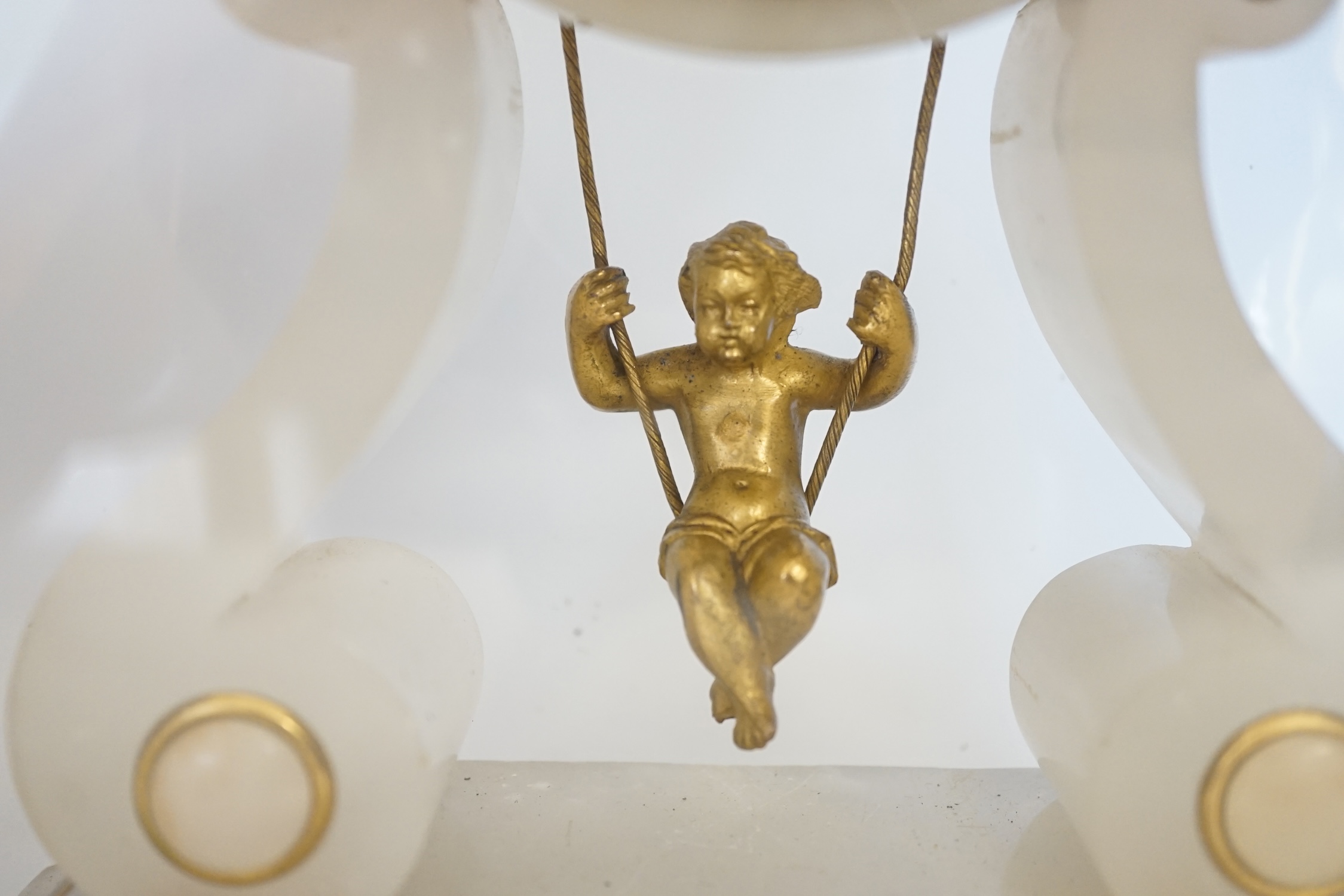 A 19th century French alabaster mantel clock under dome, 32cm total. Condition - fair to good